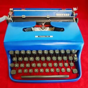 Maquina de escribir vintage Olivetti Pluma 22 - Color Azul